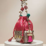Royal Handcrafted Metal Potli Bag with Coins, Shells & Pom-Pom Detailing