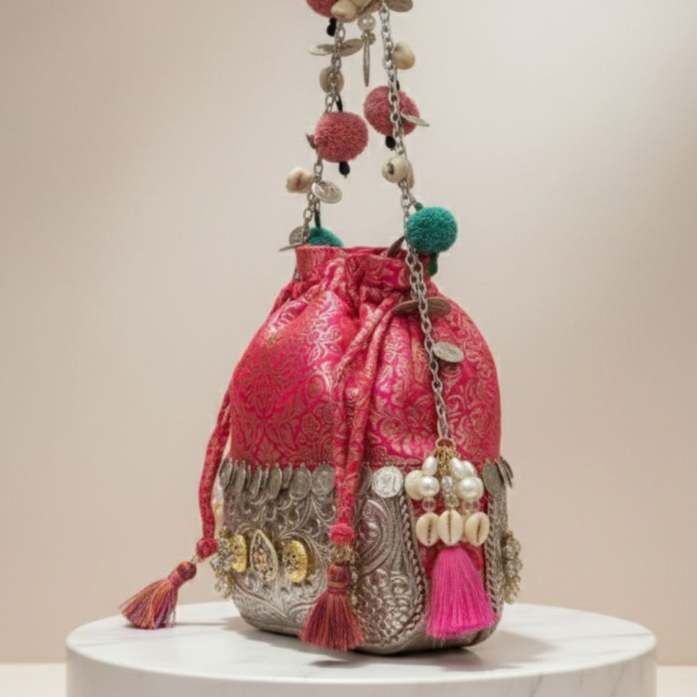Royal Handcrafted Metal Potli Bag with Coins, Shells & Pom-Pom Detailing